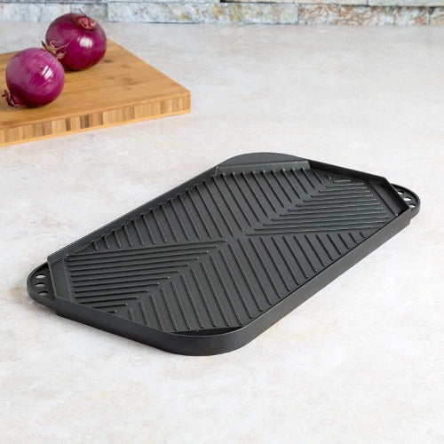Non-Stick Reversible Grill/Griddle Pan on counter with onion in background