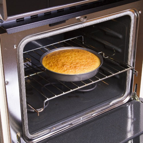 Round Cake Pan in oven with cake