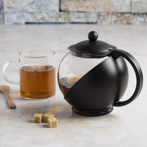 Half Moon Glass Teapot with tea on counter